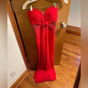 Beautiful red prom gown with beaded back